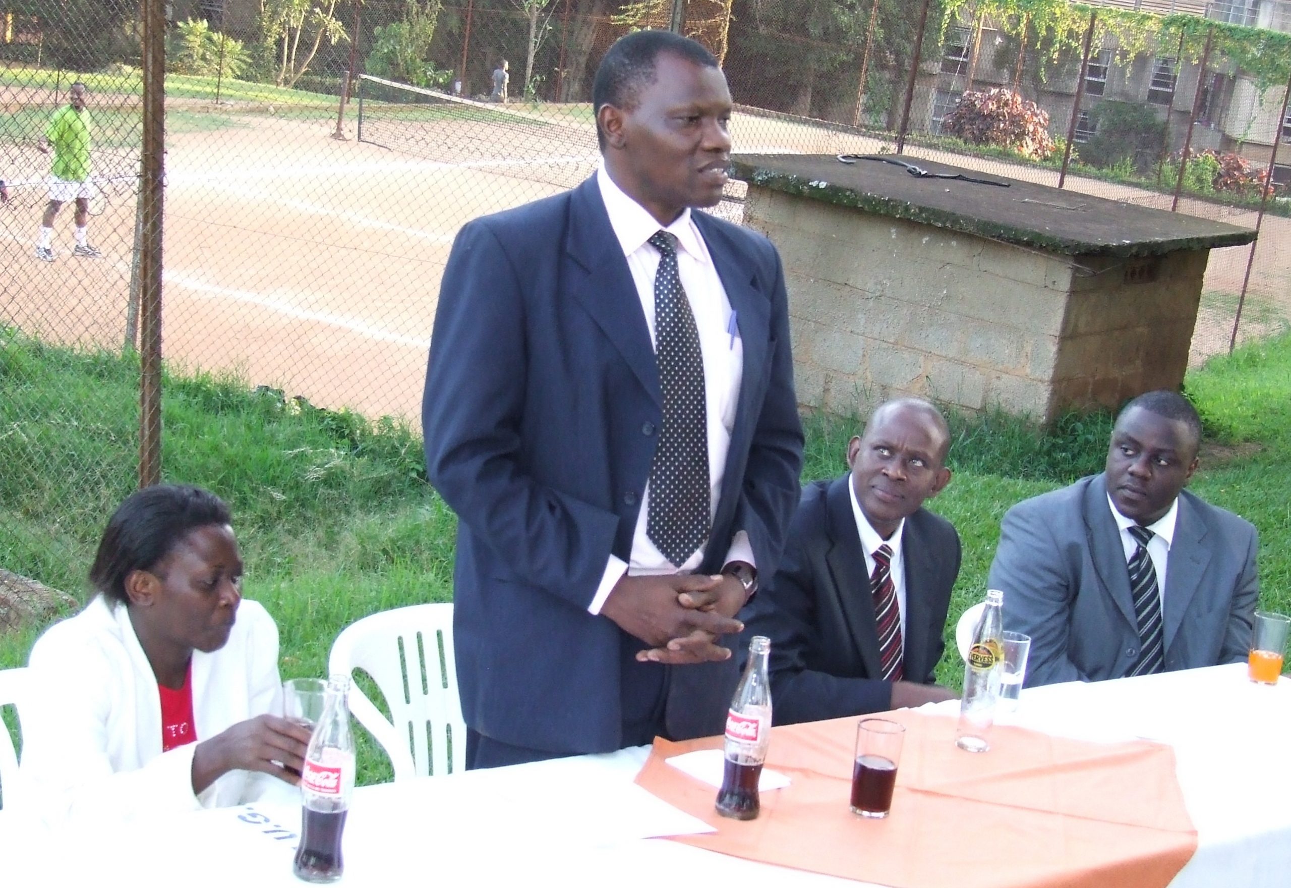 Mr. Cuthbert Mulyalya(standing) speaks on behalf of his fellow graduands