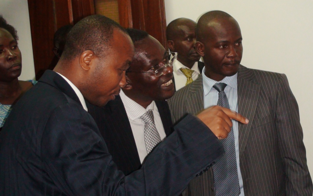 Mr. Mwesigwa(C) tours the facilities accompanied by Mr. Ruyooka(L) & Dr. Jude Lubega