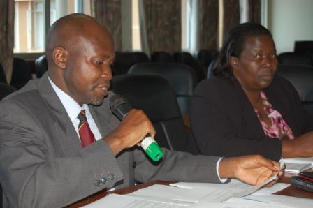 Assoc. Prof. David Owiny (L) with the Guest of Honour Dr. Anna Rose Ademun Okurut at the 9th PhD Dissemination Series 15th December 2011, Makerere University