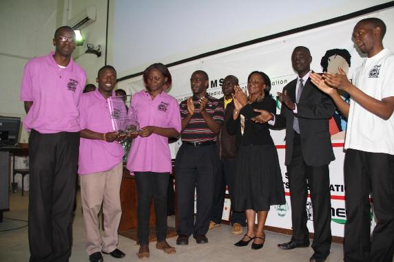 The gallant Makerere University CHS Team pose with their trophy after claiming top honours in the 1st ever Inter-University Medical Quiz Challenge 31st Aug-2nd Sept 2012, CHS, Makerere University, Kampala Uganda.