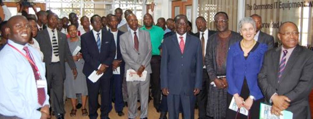 H.E. Edward Kiwanuka Ssekandi (4th R) accompanied by Justice Steven Kavuma (3rd R) and other officials visit the IDA Section of the Main Library to view the books donated by the Carnegie Corporation of New York. 