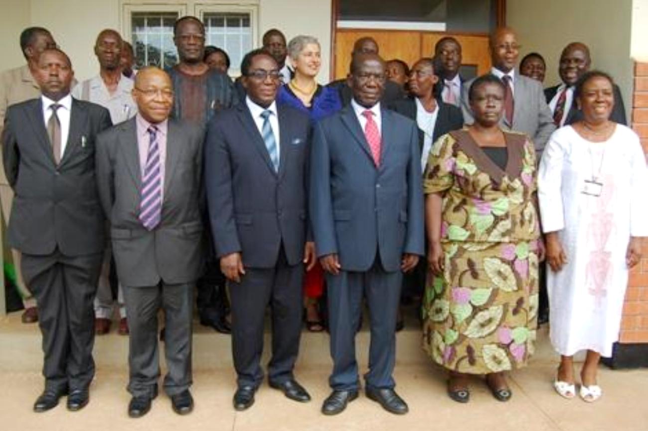 The Vice President H.E. Edward Ssekandi (3rd R) and the Vice Chancellor Prof. John Ddumba Ssentamu (3rd L) with L-R: Mr. David Kahundha Muhwezi, Prof. Tade Akin Aina, Mrs. Elizabeth Gabona, Prof. Maria Musoke and other officials (Rear) at the Inauguration of the Makerere University Main Library Extension on 29th October 2012.