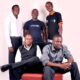 Standing L-R: The Winning trio of Aaron Tushabe, Josiah Kavuma and Joshua Okello (Team Cipher256) with their mentors Seated L-R: Dr. Davis Musinguzi and Joseph Kaizzi.