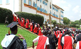 Students from Performing Arts and Film, CHUSS, Makerere University lead the Academic Procession back to the Main Building during the 60th Graduation, Makerere University, Kampala Uganda.