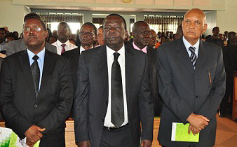 L-R: The University Secretary-Mr. David Kahundha-Muhwezi, Chairperson Council-Eng. Dr. Charles Wana-Etyem and Chancellor-Prof. G. Mondo Kagonyera at the Late Bernard Onyango Requiem Mass 17th Oct 2013, St. Augustine Chapel, Makerere University, Kampala Uganda