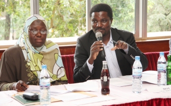 The Chaiperson MURBS BoT Hajjati Fatumah Nakatudde (L) and the Secretary MURBS BoT Dr. John Kitayimbwa (R) address the 3rd Annual AGM on 7th November 2013, CoCIS Block B, Makerere University, Kampala Uganda