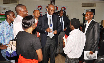 Mr. Momar Nguer, Snr VP Africa/Middle East Total interacts with members of the audience after the Public Lecture on 13th Nov 2013, Senate Building,Makerere University, Kampala Uganda