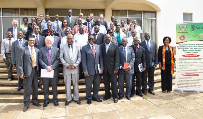 H.E. Amb Thorbjørn Gaustadsæther (2nd L) and Vice Chancellor Prof. J. Ddumba-Ssentamu (4th L) pause with other guests and Makerere staff at the NORHED Projects Launch 15th Jan 2014, SFTNB, CAES, Makerere University, Kampala Uganda.