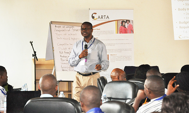 Dr. Alex Ezeh, Executive Director, APHRC, Kenya makes his presenatin on Identifying sources of funding for research during the CARTA Capacity Building Workshop, 22nd July 2014, Makerere University, Kampala Uganda
