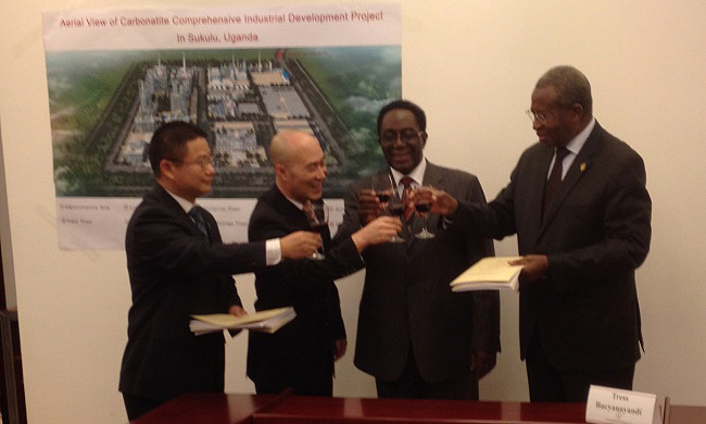 L-R: SCAU Vice Chancellor-Prof LIAO Ming, Chairman of Guangzhhou Dongsong Energy Group Company Ltd-Mr.LV Weidong, Mak Vice Chancellor-Prof. John Ddumba-Ssentamu and Minister of Agriculture, Animal Industry and Fisheries Hon. Tress Bucyanayandi toast after the quadripartite MoU signing, 23rd June 2014, Guangzhou, China