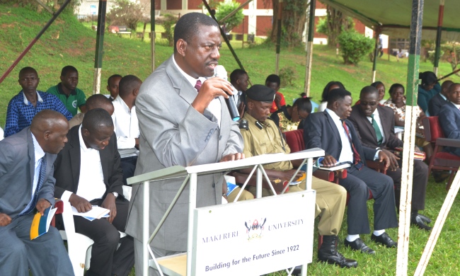 The Dean of Students, Mr. Cyriaco Kabagambe addresses Freshers during the Orientation Ceremony, 18th August 2014, Freedom Square, Makerere University, Kampala Uganda