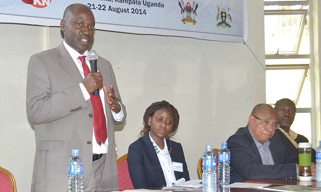 L-R: Kyambogo University Vice Chancellor-Prof. Eli Katunguka-Rwakishaya, Ms. Simbisai Zhanje-CDKN, Dr. Youba Sokona-IPCC Co-Chair Working Group III, Dr. Shuaib Lwasa-Lead Author, IPCC Working Group III address the Young Scientists Seminar, 22nd August 2014, FST-CAES, Makerere University, Kampala Uganda