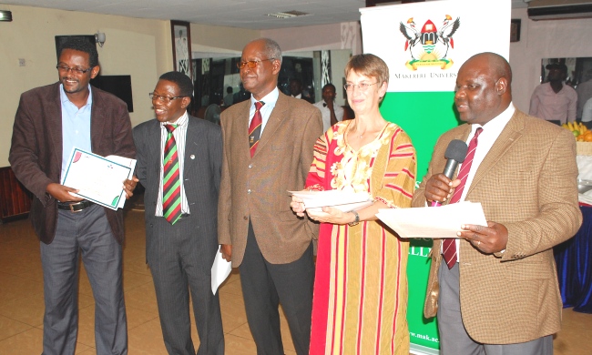 L-R: Mr. Melaku-Doctral Student, Prof. Mukadasi Buyinza-Director DRGT, Prof. Elly Sabiiti-CAES, Prof. Lotta Hansson-SLU Global and Prof. George Nasinyama-DDR DRGT at the Innovative Doctoral Training Certificate Award Ceremony, 5th September 2014, Hotel Africana, Kampala Uganda