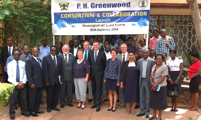 A delegation from the University of Bergen together with representatives from the Greenwood Family pose for a photo with Makerere University management and students.