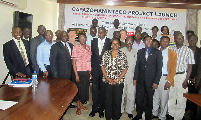 Deputy Director Research DRGT-Prof. George Nasinyama (4th L), Deputy Principal CoVAB-Dr. Jessica Nakavuma (5th L), DVCAA-Dr. Ernest Okello Ogwang (6th L), Director DRGT-Prof. Mukadasi Buyinza (3rd R) with other members of staff and students from Makerere, NMBU, Bahr El-Ghazal and Zambia Universities during the CAPAZOMANINTECO Project Launch, 25th September 2014, CoVAB, Makerere University, Kampala Uganda