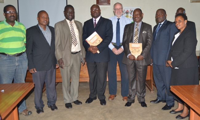 Dr. George Openjuru (3rd L), Mr. Patrick Muhinda-MoES, Prof. Budd Hall-UNESCO/University of Victoria, Ag. Vice Chancellor Prof. Barnabas Nawangwe, Prof. Fred Masagazi Masaazi-Principal CEES and participants at the GUNi 5 World Report and seminar on 28th October 2014, Makerere University, Kampala Uganda