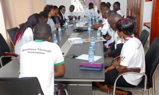 Dr. Ticora V. Jones-Division Chief, HESN, US Global Devt Lab/USAID talks to innovators during the RIC4ACE Grants Launch 13th August 2014, Makerere University, Kampala Uganda
