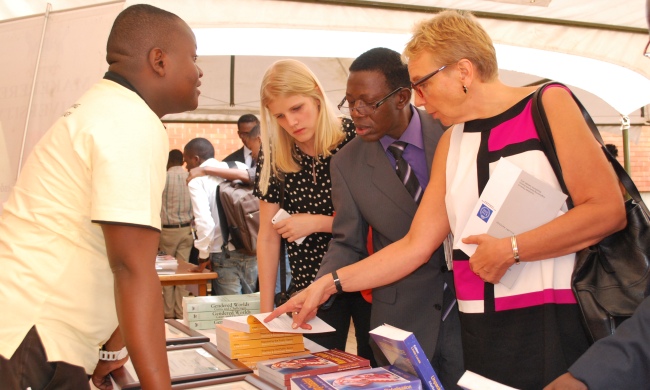 The Director Research and Graduate Training-Prof. Mukadasi Buyinza (2nd R) with Dr. Pohjolainen Yap Katri-Senior Research Advisor at the Swedish Embassy (R) during PhD Conference, CEDAT, Makerere University, Kampala Uganda