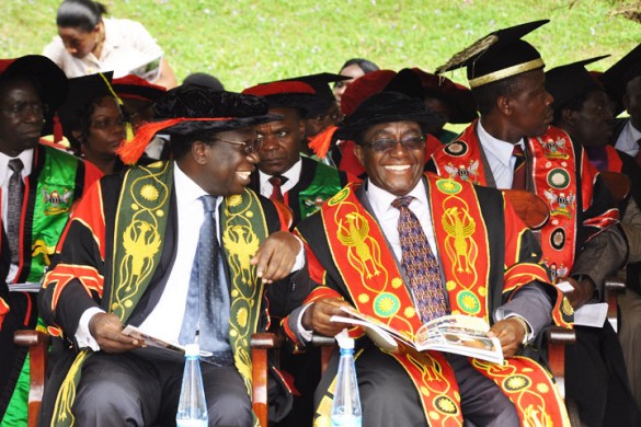 The Chair, Makerere University Council, Eng Dr Wana Etyem shares a light moment with Vice Chancellor Prof J Ddumba-Ssentamu.