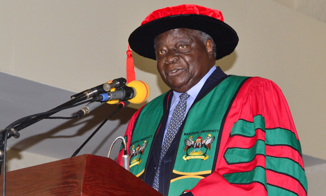 H.E Mwai Kibaki delivering the inaugural Lecture during the launch of H.E Mwai Kibaki Presidential Library in the Makerere University Main Hall.