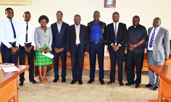 The newly elected Electoral Commission for the 81st Guild Elections with officals in the Office of the Dean of Students