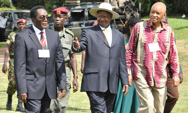H. E President Yoweri K. Museveni (Middle) together with the Chancellor, Prof. George Mondo Kagonyera (Right) and Vice Chancellor, Prof. John Ddumba-Ssentamu (Left) on arrival at Freedom Square.