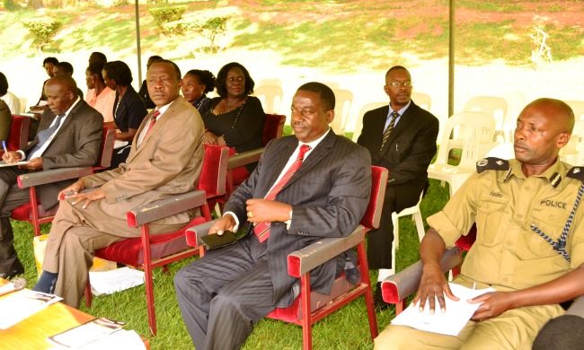 L-R: Mr. Charles Ssentongo-AR Dept., Mr. Alfred Masikye Namoah-AR, Mr. Cyriaco Kabagambe-Dean of Students and ASP Kasimo Thomas-Chief Security Officer at the Freshers' Orientation, 27th Aug 2015, Freedom Square, Makerere University, Kampala Uganda