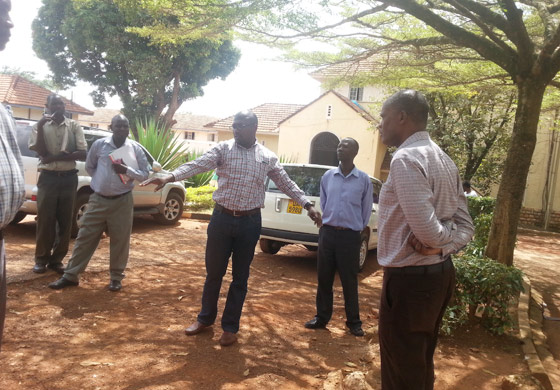 Director Estates and Woks Department, Fred Nuwagaba (C) together with officials from the Office of the Dean of Students and Kalsa Developments Uganda limited at the site near Nkurumah Hall.