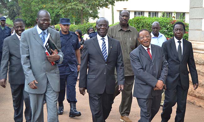 [Front-Row] Assoc.Prof. Okello Ogwang welcomes H.E Edward Kiwanuka Ssekandi, Prof. Ezra Suruma and Mr. Edward Gaamuwa to the Advancing Uganda’s Economy Book Launch by Prof. Suruma on 23rd September 2014, Makerere University, Kampala Uganda