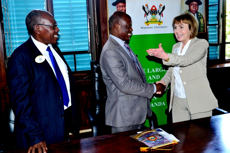 L-R, the District Governor, 411B (Uganda & Tanzania), 2016-17, Mr. Venie Tinkumanya, Deputy Vice Chancellor for Finance and Administration Prof. Barnabas Nawangwe together with  the Second Vice President of Lions Club International; Lion Gudrun Bjort Yngvadottir.