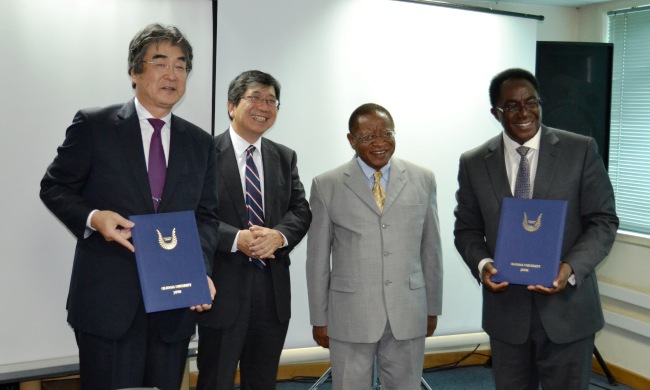 L-R: Dr. Kiyoshi Morita, Rector Okayama University; H.E. Kazuaki Kameda-Ambassador of Japan to Uganda; Prof. Ezra Suruma-Chancellor of Makerere University; Prof. John Ddumba-Ssentamu-Vice Chancellor of Makerere University pose for a photo after signing of MoU, 8th Nov 2016, Embassy of Japan in Kampala, Uganda