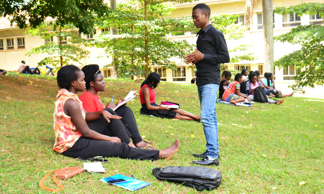 Students in discussion groups near the College of Humanities and Social Sciences