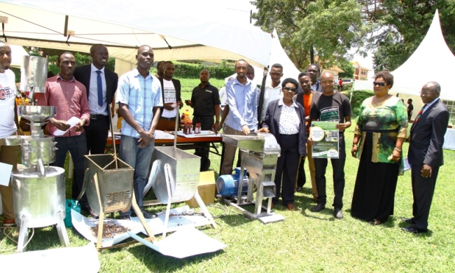 The State for Animal Industry-Hon. Joy Kabatsi (3rd R) flanked by Principal CAES-Prof. Bernard Bashaasha (R), MAAIF Officials and Student Leaders tours the Agricultural Engineering stand durint the Annual Students' Exhibition, 21st March 2017, Freedom Square, Makerere University, Kampala Uganda