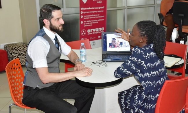 Dr. Alex Moseson-I2D Purdue University (L) chats with Ms. Grace Nakibaala-PedalTap Inventor during his visit to the RAN Innovation Lab, 20th February 2017, School of Public Health, Makerere University, Kampala Uganda