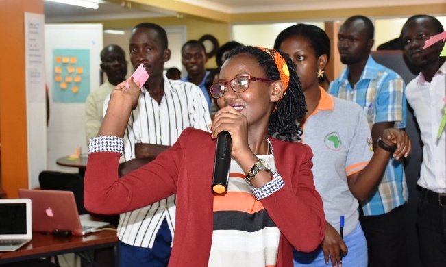 A partcipant takes part in the Group activity during the Grand Launch of RAN Technovation Clubs, 25th February 2017, School of Public Health, Makerere University, Kampala Uganda