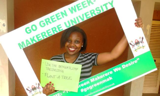 A #GoGreenMak Campaign participant shows her support on Day2, Africa Hall, Makerere University, Kampala Uganda