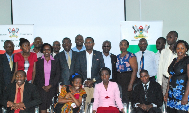 The Dean of Students-Mr. Cyriaco Kabagambe (C) with members of management, stakeholders and students at the students with disabilities Sensitization Workshop, 22nd June 2017, Senate Building, Makerere University, Kampala Uganda
