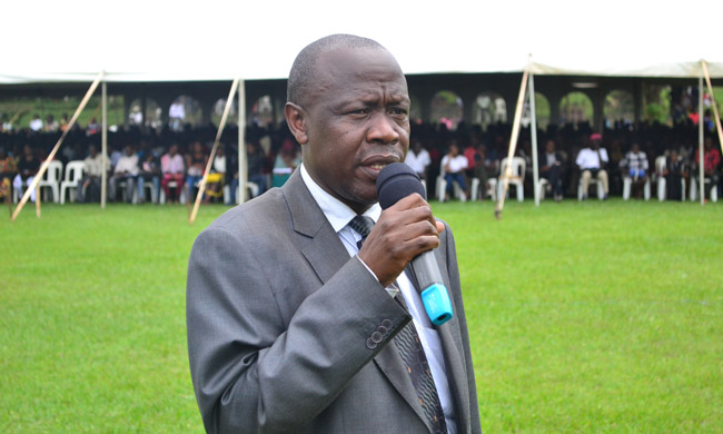 Mr Alfred Masikye Namoah, Academic Registrar- Makerere University  speaking at the orientation ceremony on 18th August 2017.