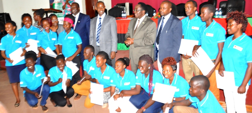 Some of the Scholars posing for a photo with the Vice Chancellor  Prof. John Ddumba-Ssentamu and the Chairperson Selection Committee Assoc. Prof. Aaron Mushengyezi.