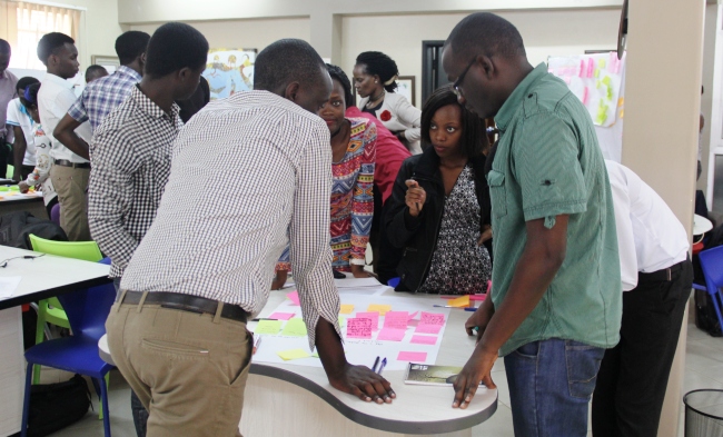 Participants brainstorm during the HCD Training held on 26th July 2017 at the RAN Kololo Office, MakSPH, Makerere University, Kampala Uganda