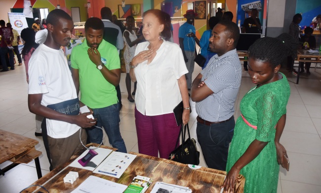 A RAN Innovator explains how his application works to the World Youth Skills Day Event participants who included Dr. Maggie Kigozi (3rd R), 15th July 2017, Ntinda, Kampala Uganda