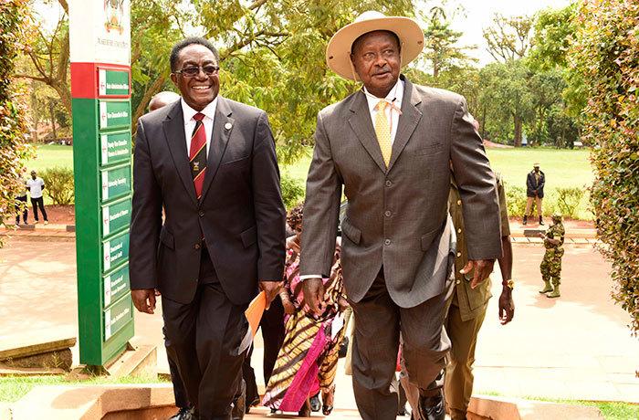 Vice Chancellor Prof Ddumba Ssentamu walking President Yoweri Museveni to Main Hall