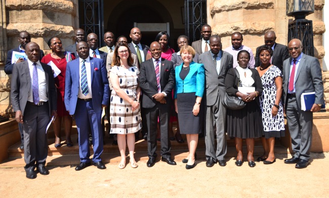 Vice Chancellor Prof. Barnabas Nawangwe (Middle) takes a group photo with members of Management, Directors and Principals after a meeting with Dame Barbara Stocking (to his Left) - President of Murray Edwards College and Mrs. Helen Pennant (to his Right) - Director of the Cambridge Trust. The meeting was held in the Council Room on 12th September 2017, Makerere University, Kampala Uganda