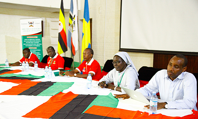 Prof. Rev. Sister Dominic Dipio, Dr. Aaron Mushengyezi, Prof. William Muhumuza, Prof. Anthony Mugeere and Dr.  Julius Omona discussing their research projects.