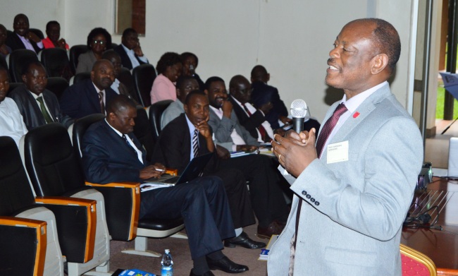 Vice Chancellor-Prof. Barnabas Nawangwe (R) addresses College Principals, Directors, Deans and Heads of Department during the Induction Workshop, 30th October 2017, Makerere University, Kampala Uganda