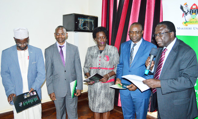 The Chairperson Makerere University Council Eng. Dr. Charles Wana-Etyem (extreme right) speaking after the inauguration ceremony. On his left is Mr. Ngabirano Precious - the Chair, Ms. Carolyne Nabaasa (centre), Dr Umar Kakumba and Mr. Ahmed Ssentongo, members of MAK Students Disciplinary Committee