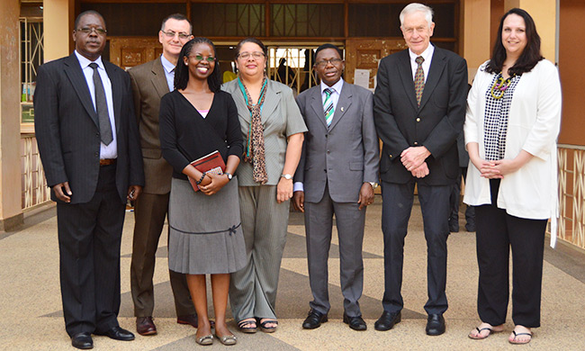 Dr Wildfred Lajul  Dr. Wilfred Lajul - Head of Department of Philosophy and Development Studies(Left), Dr.Krige Siebrits-Stellenbosch University, Ms. Angella Asio -Project Administrator - Directorate of Research and Graduate Training (DRGT), Director Prof. Buyinza Mukadasi (DRGT), Dr. Ada Jansen and Prof. Estian Calitz from Faculty of Economics and Management Sciences Stellenbosch University, Ms. Corina Du Toit - Programme Manager of the African Doctoral Academy at Stellenbosch University,  pose for a photo