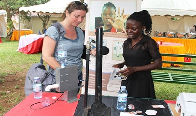 PedalTap Lead Innovator-Grace Nakibaala explains the workings of her innovation at Green Drinks Event, 13th September 2017, Innovation Village, Kampala Uganda
