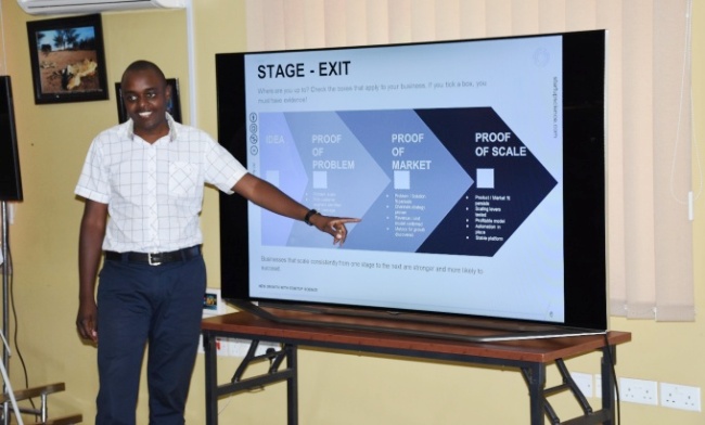Brian Ndyaguma, In-Charge Business Modeling at RAN takes participants through a capacity building session, 28th September 2017, RAN Kololo Offices, MakSPH, CHS, Makerere University, Kampala Uganda