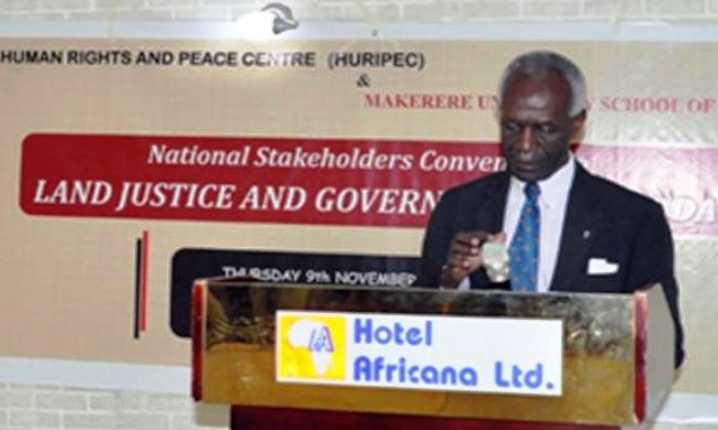 Justice James Ogoola presides over the National Stakeholder’s Dialogue on Land Justice and Governance in Uganda, 9th November 2017, Hotel Africana, Kampala Uganda